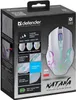 The image shows the retail packaging of a white wireless gaming mouse. The packaging displays the product name, brand, and various features of the mouse through text and graphics. Produktbild-Vorschau