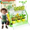 A child is shown with a mini-greenhouse kit, holding a watering can. Podgląd zdjęcia produktu