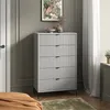 A bedroom scene with a dresser, artwork, and curtains. Podgląd zdjęcia produktu