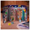A 3D advent calendar shaped like a Christmas factory, with small blocks in front of it. Voir les images du produit