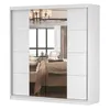 A white sliding door wardrobe with mirrored doors, reflecting a bedroom interior. Voir les images du produit