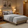 A bedroom scene with a bed, nightstands, and artwork. Náhled obrázku produktu
