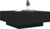 A black coffee table with a plant and a cup of coffee on it. Anteprima dell’immagine prodotto