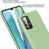 A close-up shot of a light green silicone phone case on a smartphone, highlighting its raised edges for screen and camera protection. Produktbild-Vorschau
