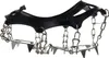 A pair of black and silver crampons with metal spikes and chains, shown against a white background. Podgląd zdjęcia produktu