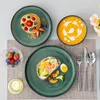 A top-down view of a table setting with breakfast items. Voir les images du produit