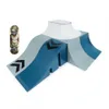 A fingerboard and a skate ramp set against a white background. Náhľad obrázku produktu