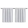 Two white curtains hanging on a rod against a white background. Náhled obrázku produktu