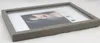 A framed picture with a woman's face on a white background. Produktbild-Vorschau