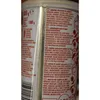 A close-up of a food product can, showing nutritional information and ingredient lists in multiple languages. Produktbild-Vorschau