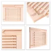 A collage of four close-up images showcasing a wooden bread cutting board with a crumb catcher. Produktbild-Vorschau