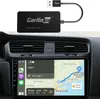 A Carlinkit adapter connected to a car's infotainment system displaying navigation. Produktbild-Vorschau