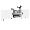 A white TV stand with black legs and brown handles, shown against a white background. Produktbild-Vorschau