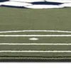A close-up view of a rug with a soccer field pattern. Anteprima dell’immagine prodotto