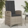 An outdoor chair with a cushion on a patio. Náhľad obrázku produktu