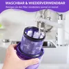 A hand is holding a purple vacuum cleaner filter under a running faucet. Produktbild-Vorschau
