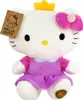 A plush toy of Hello Kitty wearing a crown and a dress, with a tag attached. Anteprima dell’immagine prodotto