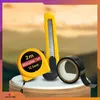 A collection of tools, including a measuring tape, utility knife, and electrical tape, displayed on a pedestal against a blurred background. Produktbild-Vorschau