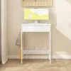 A white standing desk with a computer and keyboard, a backpack hanging on the side, against a light-colored wall. Náhľad obrázku produktu