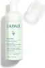 A bottle of Caudalie Vinoclean Instant Foaming Cleanser on a white background with the cap off. Voir les images du produit