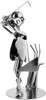 A metallic figurine of a golfer in mid-swing, standing on a circular base. Produktbild-Vorschau