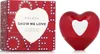 A product shot of Escada Show Me Love Eau De Parfum spray and its packaging. Podgląd zdjęcia produktu