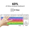 A hand is shown pressing keys on a compact RGB gaming keyboard, with text and diagrams illustrating its features. Produktbild-Vorschau
