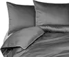 A close-up view of gray bedding, including pillows and a duvet cover. Náhled obrázku produktu