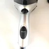 Close-up of the handle of a hairdryer. Produktbild-Vorschau