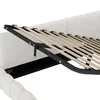 A close-up view of a bed frame with wooden slats, showing the mechanism for lifting the mattress. Voir les images du produit