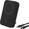 A black Belkin BoostCharge Pro inductive power bank with two USB-C cables. Voir les images du produit