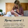 A mother is feeding her baby with a bottle while sitting on a bed. Produktbild-Vorschau