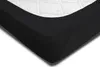 A close-up view of a black fitted sheet on a mattress. Produktbild-Vorschau