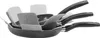 A stack of frying pans with protective inserts between them. Produktbild-Vorschau