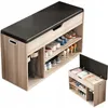 A shoe cabinet with a bench seat and storage compartments, displaying various shoes. Podgląd zdjęcia produktu