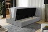 A grey upholstered bed frame with the mattress lifted to reveal the storage compartment underneath. Voir les images du produit