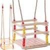 Two wooden swings are shown against a white background. One is a close-up of a larger swing, and the other is a smaller swing in the background. Produktbild-Vorschau