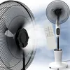 A studio shot of two fans, one in the foreground and one in the background, with a remote control. Produktbild-Vorschau