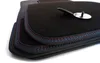 A stack of car floor mats with contrasting stitching. Voir les images du produit