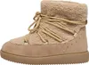 A side view of a beige boot with fluffy lining and tan laces. Produktbild-Vorschau