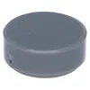 A single, dark gray, round LEGO tile is shown from a slightly elevated, diagonal angle against a light gray background. Produktbild-Vorschau