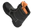 A black winter work boot with a fur lining is shown against a white background. Produktbild-Vorschau