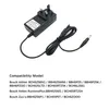 A black power adapter with a UK plug and a coiled cable with a connector. Podgląd zdjęcia produktu