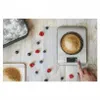 A digital kitchen scale with flour and berries on a wooden surface. Náhľad obrázku produktu