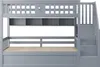 A grey bunk bed with a built-in shelf and stairs. Produktbild-Vorschau