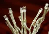 A close-up shot of several LED lights on a string. Produktbild-Vorschau