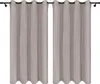 Two gray curtains hanging on a curtain rod. Náhľad obrázku produktu