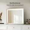 A lighted makeup mirror is displayed on a white dresser with drawers, next to a vase with dried flowers and some cosmetic products. Podgląd zdjęcia produktu