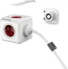 A white PowerCube with a white cable and a gray clip, shown with a wall mount. Produktbild-Vorschau