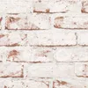 A close-up view of a brick wall texture. Produktbild-Vorschau